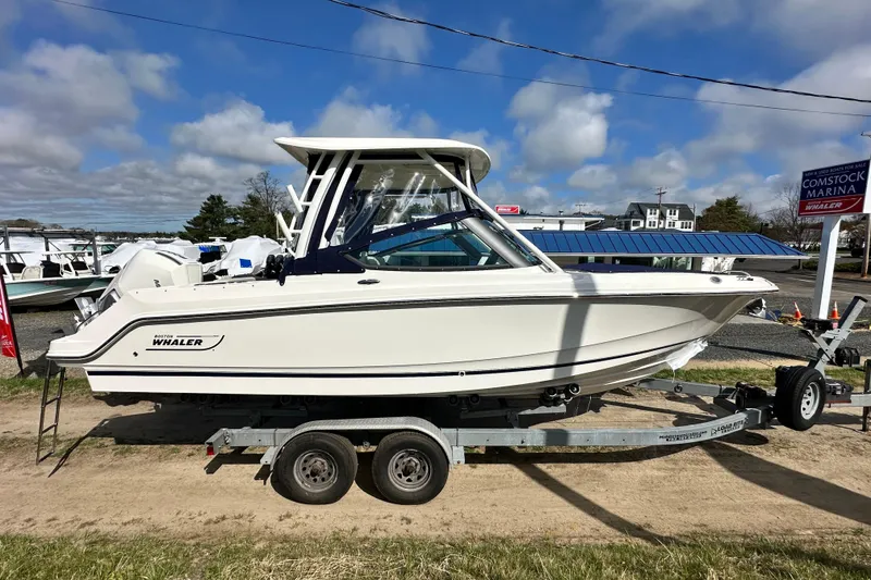 Slide: The Image of 2026 Boston Whaler 240 Vantage boat on trailer at Comstock Marina. - 48
