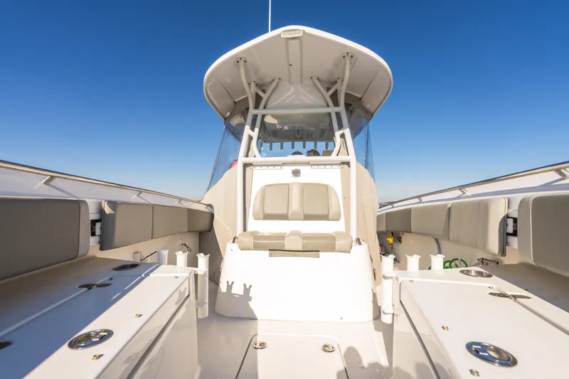 Slide: The Image of 2021 Cape Horn 32 XS boat interior with seating and clear blue sky. - 12