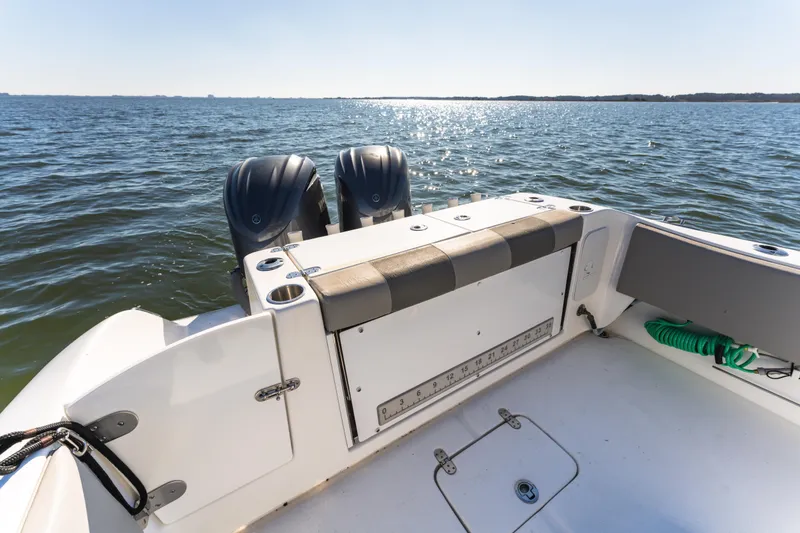 Slide: The Image of 2021 Cape Horn 32 XS boat with dual engines on open water. - 15