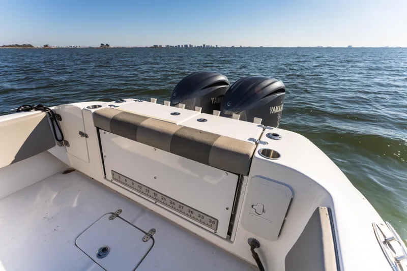 Slide: The Image of 2021 Cape Horn 32 XS boat with Yamaha engines on open water. - 16