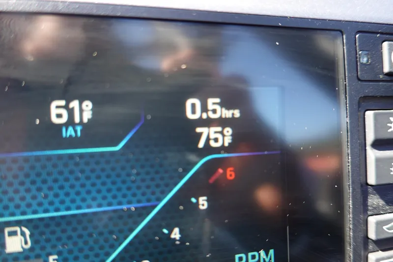 Slide: The Image of Dashboard display of Axis A245, 2026 model, showing temperature and RPM details. - 19