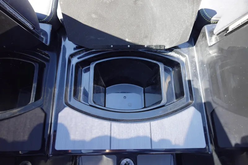 Slide: The Image of 2026 Axis A245 boat storage compartment with sleek black interior design. - 33