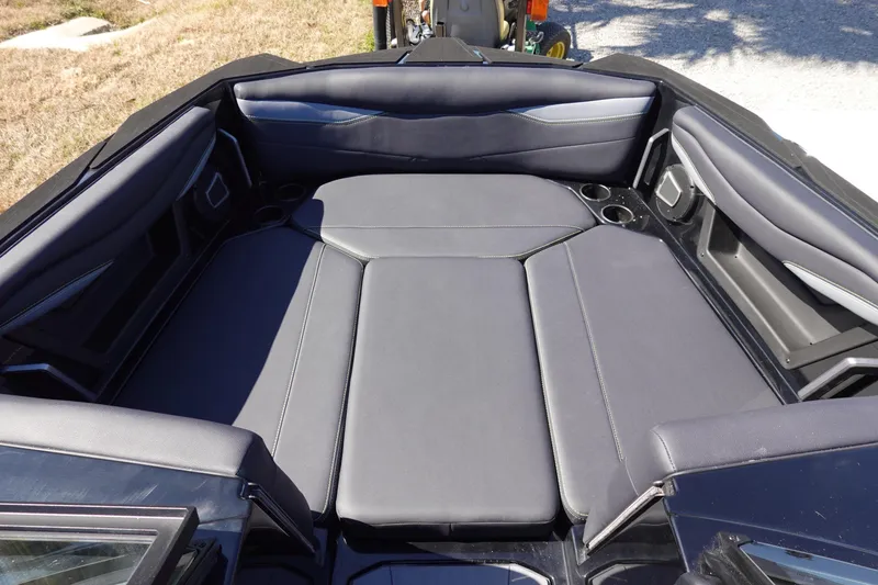 Slide: The Image of 2026 Axis A245 boat interior with spacious seating and cup holders. - 34