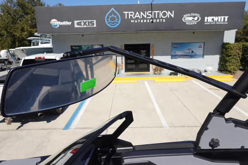 Slide: The Image of 2026 Axis A245 boat at Transition Watersports dealership entrance. - 36