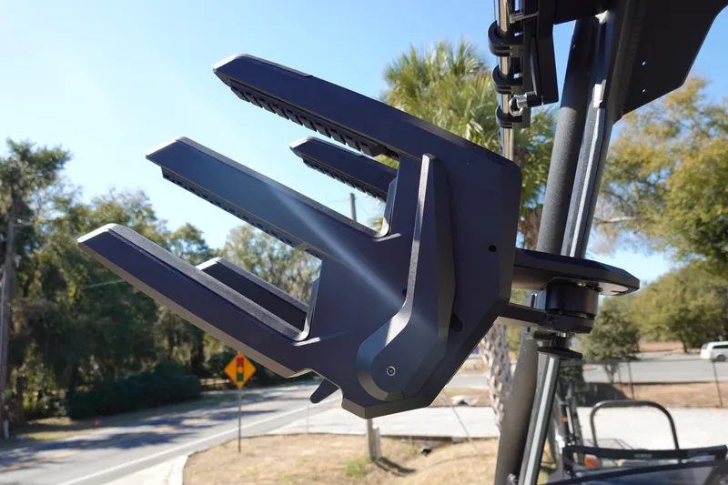 Slide: The Image of 2026 Axis A245 boat tower with wakeboard rack, outdoors on a sunny day. - 37