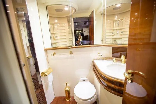 Slide: The Image of Luxurious bathroom in 2003 Azimut 74 Solar yacht with elegant fixtures and mirrored walls. - 11