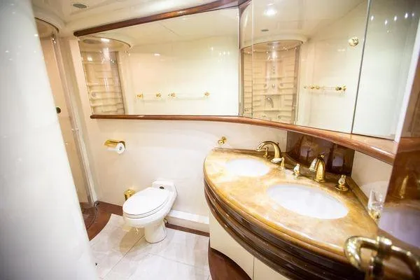 Slide: The Image of Luxurious bathroom in 2003 Azimut 74 Solar yacht with dual sinks and elegant fixtures. - 12