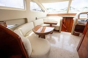 Slide: The Image of Luxurious interior of 2003 Azimut 74 Solar yacht with elegant seating and wooden accents. - 5