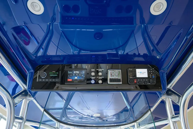 Slide: The Image of 2026 Valhalla Boatworks V-28 Bay control panel with advanced navigation and communication systems. - 11