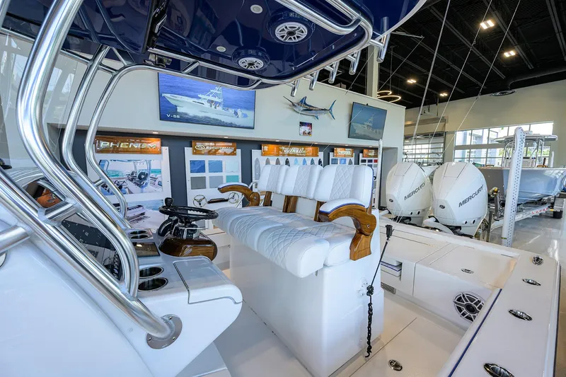 Slide: The Image of 2026 Valhalla Boatworks V-28 Bay interior with luxurious seating and modern controls. - 12