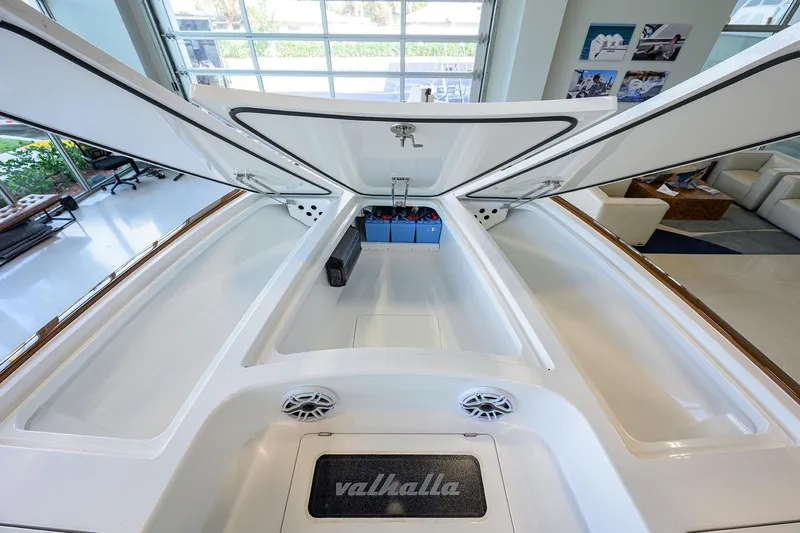 Slide: The Image of 2026 Valhalla Boatworks V-28 Bay interior with open storage compartments and modern design. - 18