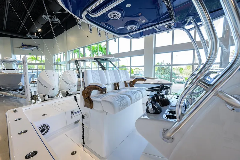 Slide: The Image of 2026 Valhalla Boatworks V-28 Bay interior with luxurious seating and modern controls. - 21