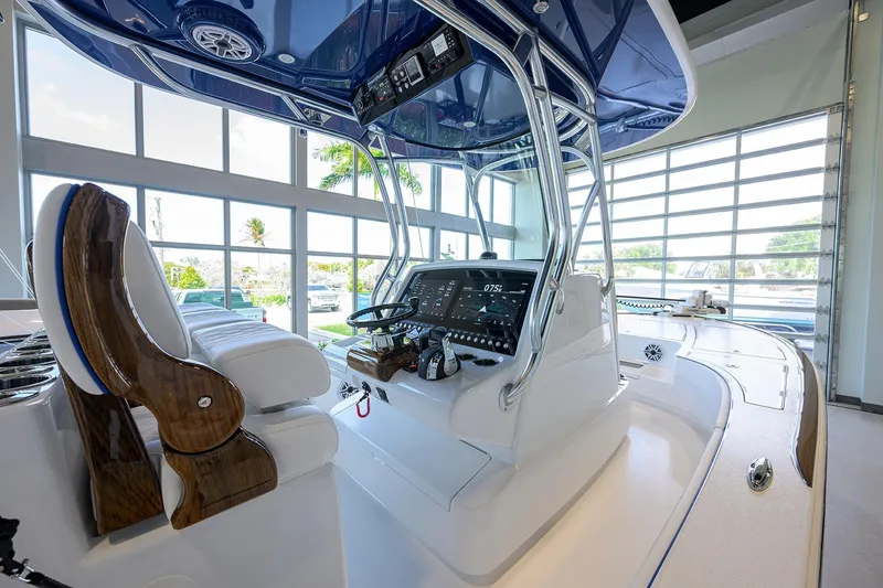 Slide: The Image of 2026 Valhalla Boatworks V-28 Bay interior with modern helm and seating. - 22