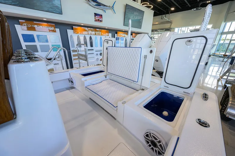 Slide: The Image of 2026 Valhalla Boatworks V-28 Bay interior with storage compartments and seating. - 26