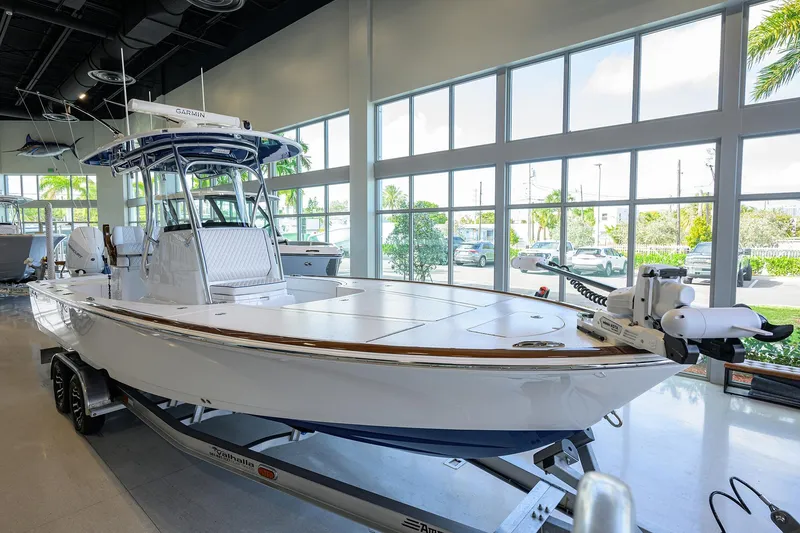 Slide: The Image of 2026 Valhalla Boatworks V-28 Bay displayed indoors on a trailer. - 3