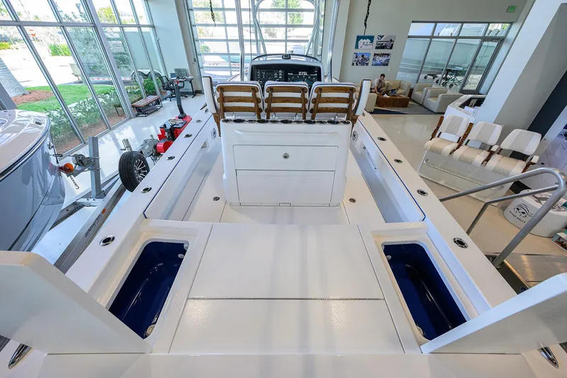 Slide: The Image of 2026 Valhalla Boatworks V-28 Bay interior with seating and storage compartments. - 31