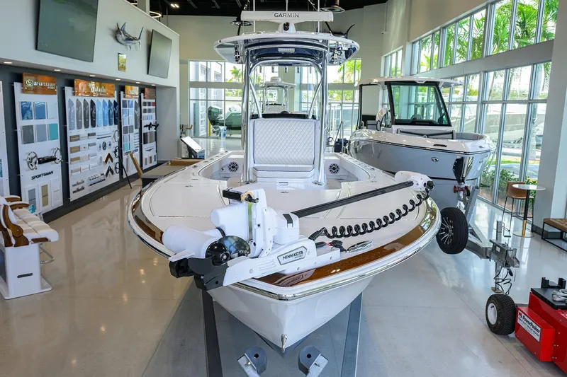 Slide: The Image of 2026 Valhalla Boatworks V-28 Bay displayed in a modern showroom. - 4