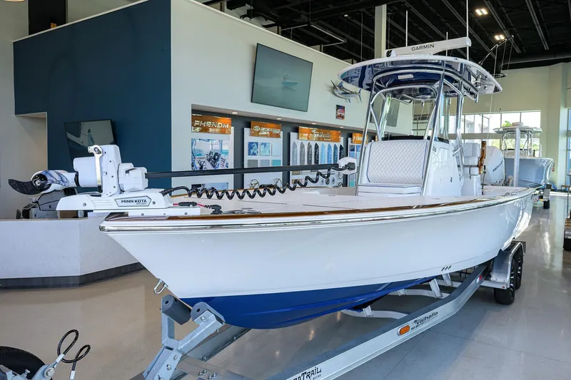 Slide: The Image of 2026 Valhalla Boatworks V-28 Bay displayed indoors on a trailer. - 5