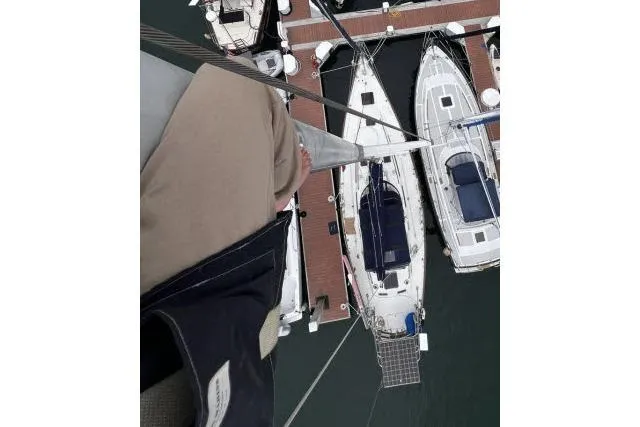 Slide: The Image of Bird's-eye view of Hylas Custom 44 sailboats docked at a marina, 1988 model. - 39