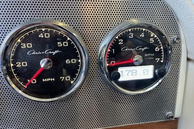 Slide: The Image of Close-up of 2021 Chris-Craft Launch 27 speedometer and tachometer gauges. - 22