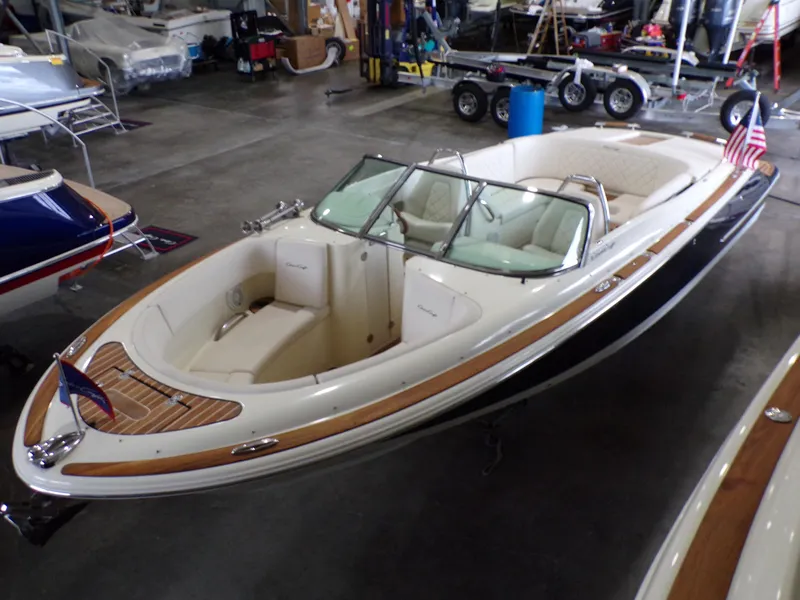 Slide: The Image of 2021 Chris-Craft Launch 27 boat in a storage facility. - 3