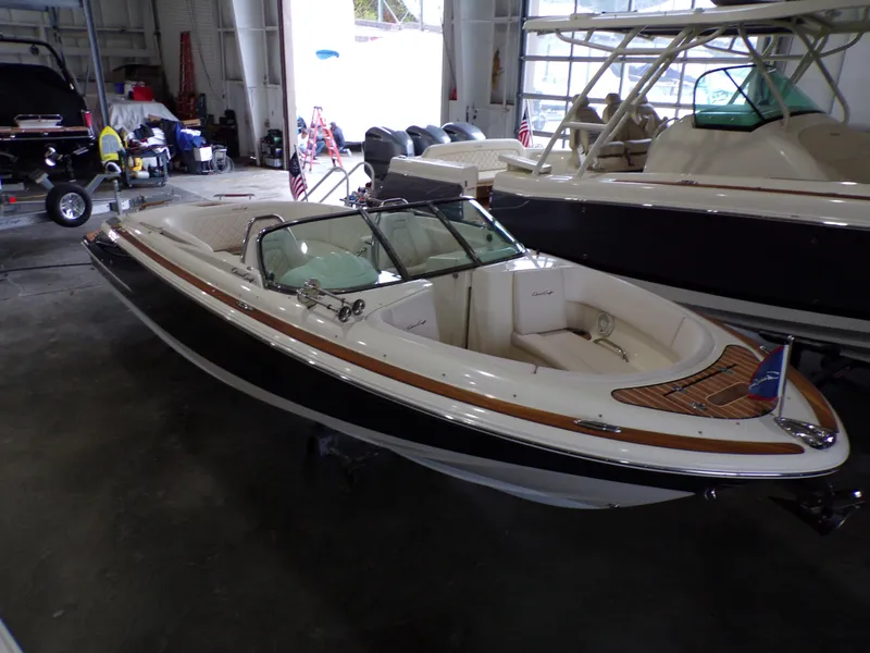 Slide: The Image of 2021 Chris-Craft Launch 27 boat in a storage facility. - 4