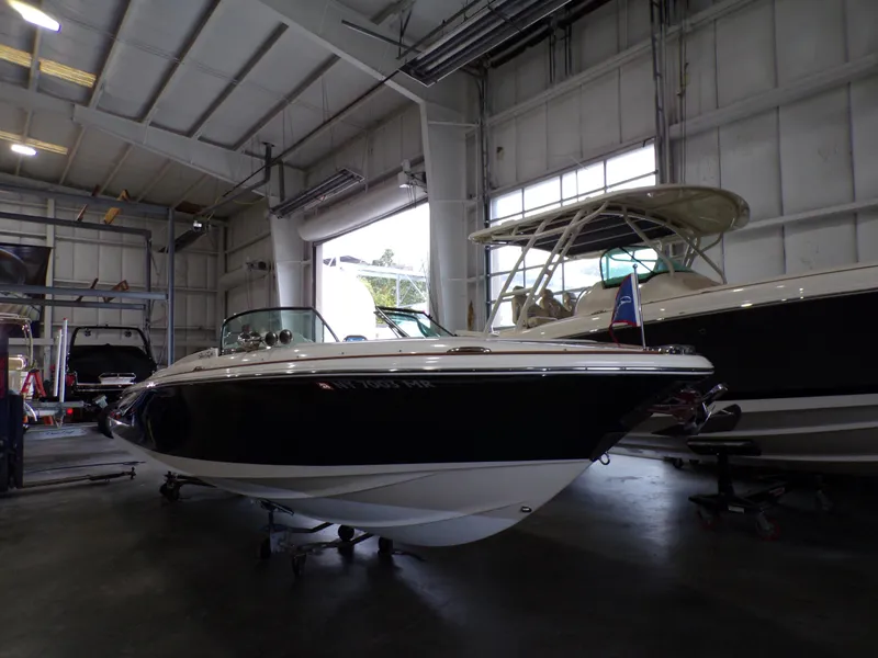 Slide: The Image of 2021 Chris-Craft Launch 27 boat in a storage facility. - 8