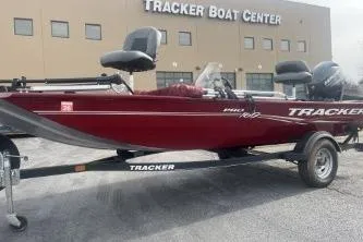 The Image of 2020 Tracker Pro 170 boat in red, parked at Tracker Boat Center. - 1