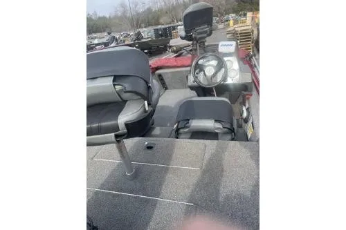 Slide: The Image of 2020 Tracker Pro 170 boat interior with steering console and seating. - 3