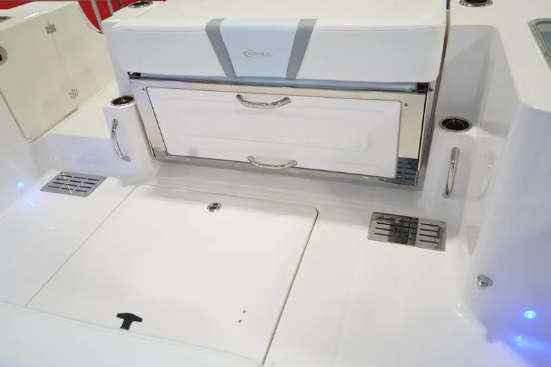 Slide: The Image of 2026 Robalo R300 Center Console boat interior with storage and seating features. - 26