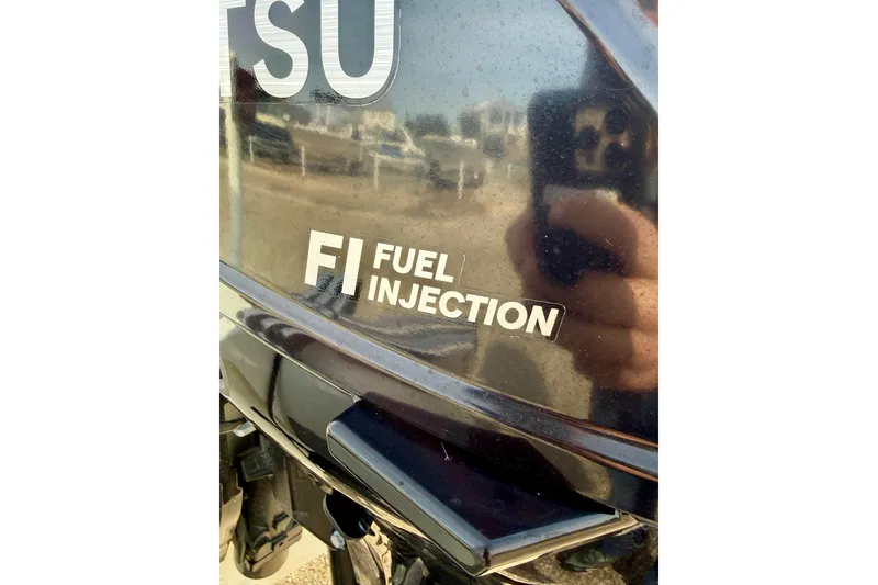 Slide: The Image of 2023 Rigid Boats 10 Sport with fuel injection engine detail. - 16