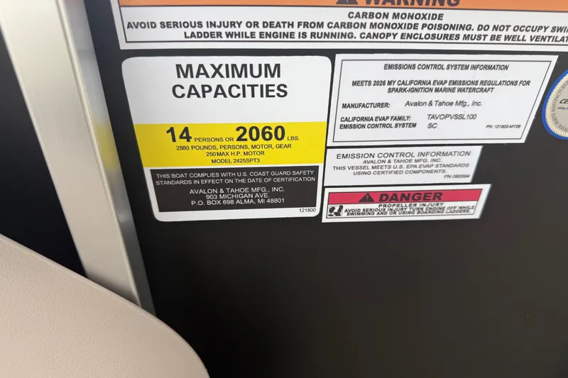 Slide: The Image of 2026 Avalon LSZ Quad Lounger Shift capacity label, 14 persons or 2060 lbs, safety warnings. - 26