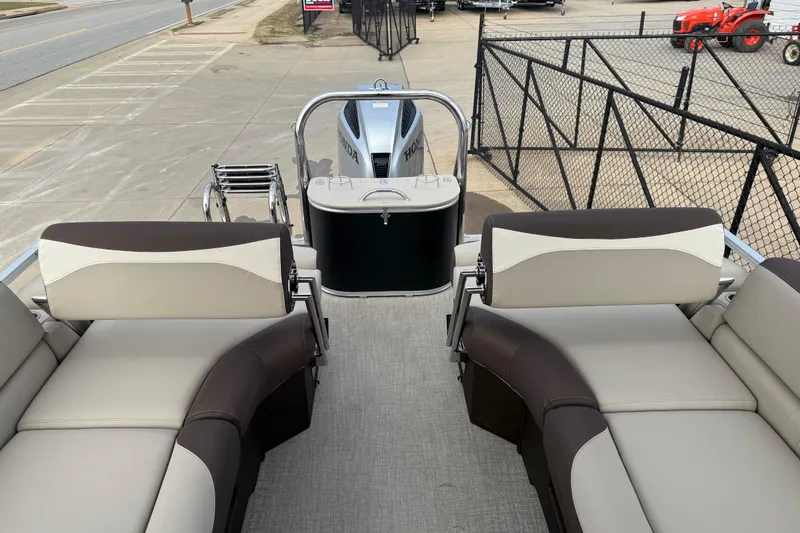 Slide: The Image of 2026 Avalon LSZ Quad Lounger Shift boat interior with plush seating and Honda engine. - 31