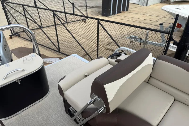 Slide: The Image of 2026 Avalon LSZ Quad Lounger Shift boat interior with beige and brown seating. - 33