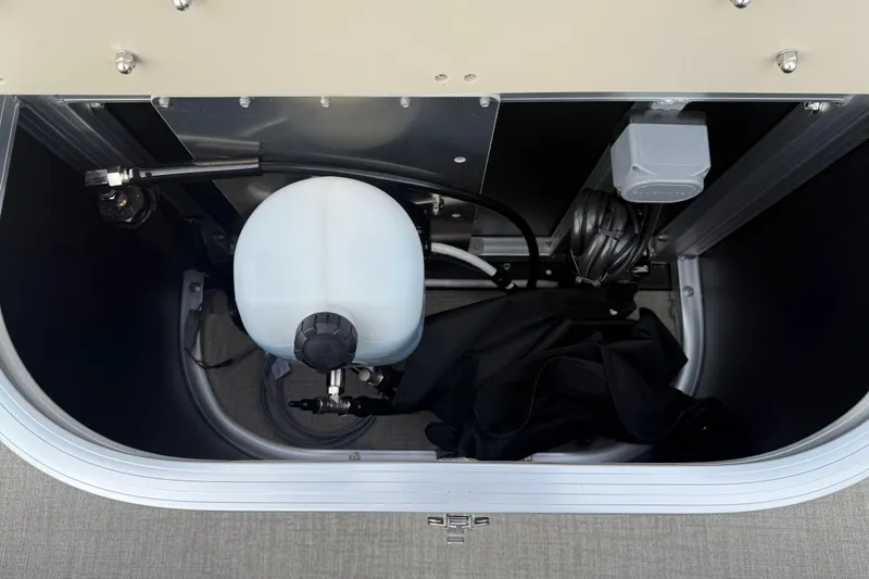 Slide: The Image of Storage compartment of 2026 Avalon LSZ Quad Lounger Shift with equipment and wiring. - 36