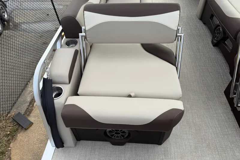 Slide: The Image of 2026 Avalon LSZ Quad Lounger Shift boat seat with cup holders and modern design. - 39
