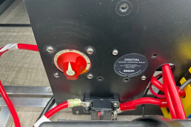 Slide: The Image of Electrical panel with red switch and digital voltage relay in 2026 Avalon LSZ Quad Lounger Shift. - 43