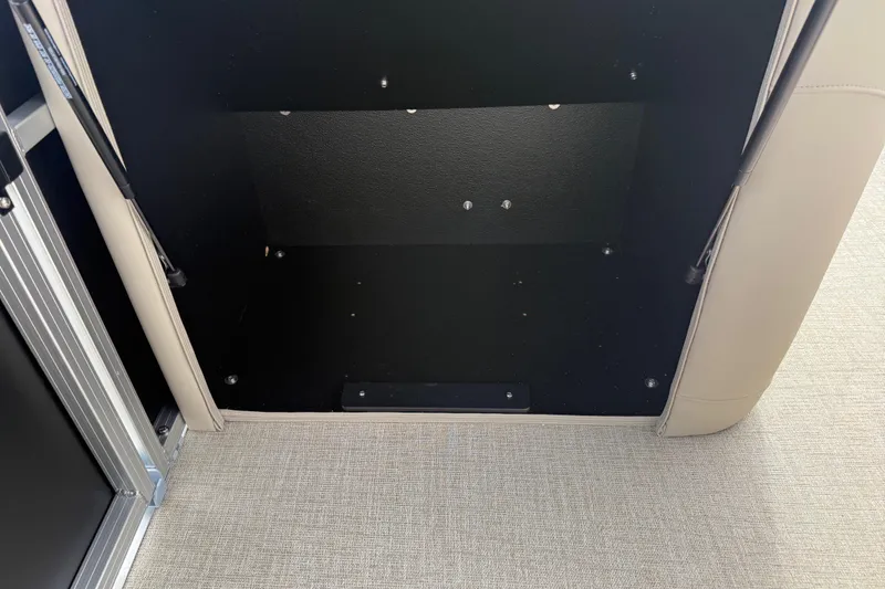 Slide: The Image of 2026 Avalon LSZ Quad Lounger Shift storage compartment with beige interior and metal frame. - 47