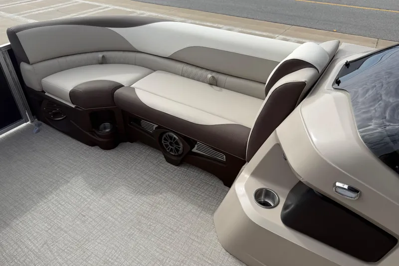 Slide: The Image of Luxurious seating on 2026 Avalon LSZ Quad Lounger Shift boat with modern design and cup holders. - 48