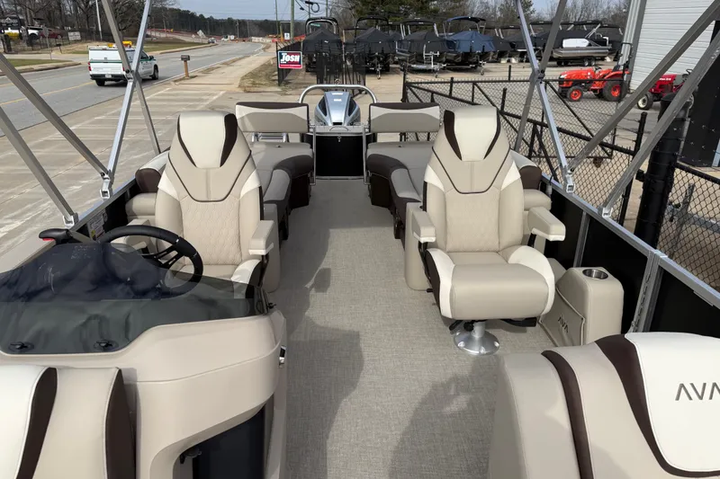 Slide: The Image of 2026 Avalon LSZ Quad Lounger Shift pontoon boat with luxurious seating and modern design. - 52