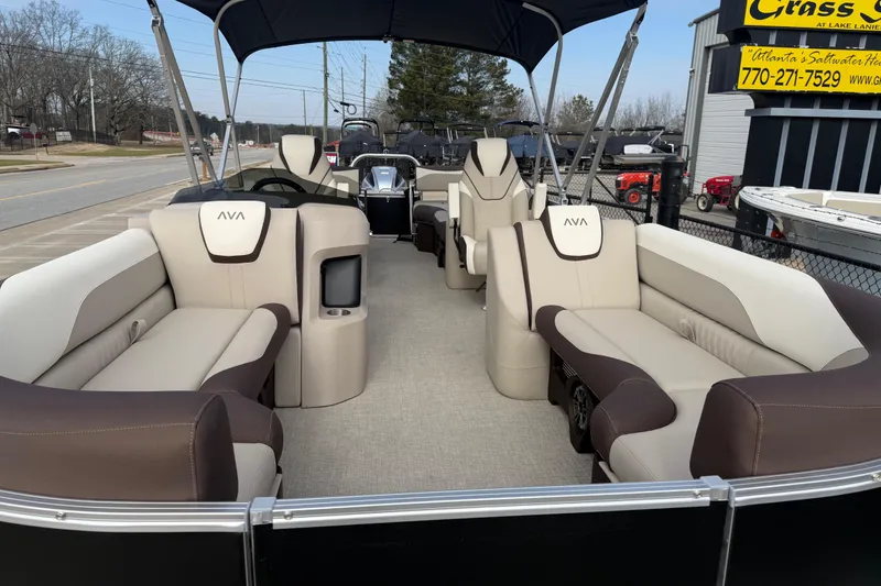 Slide: The Image of 2026 Avalon LSZ Quad Lounger Shift pontoon boat with spacious seating and modern design. - 7