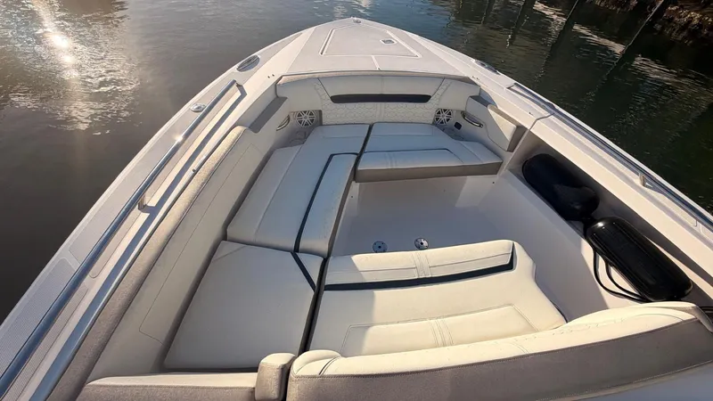 Slide: The Image of Interior view of 2023 Tiara Sport 34 LS with luxurious seating. - 33