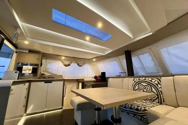 Slide: The Image of Luxurious interior of 2023 Fountaine Pajot Isla 40 catamaran with modern design and skylight. - 15