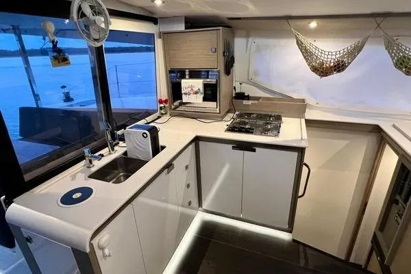 Slide: The Image of Modern kitchen interior of 2023 Fountaine Pajot Isla 40 catamaran with sleek design and appliances. - 17