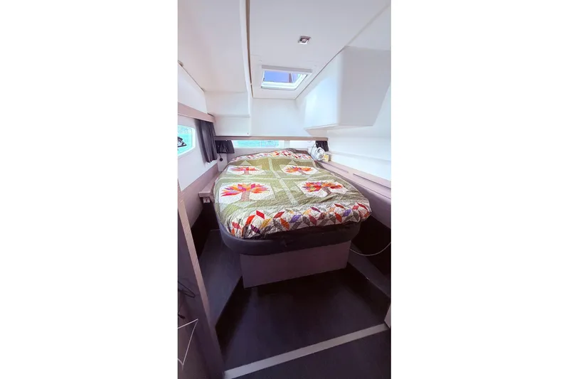 Slide: The Image of Interior cabin of 2023 Fountaine Pajot Isla 40 with colorful bedding. - 28