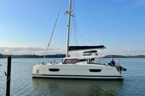 Slide: The Image of 2023 Fountaine Pajot Isla 40 catamaran sailing on calm waters. - 3