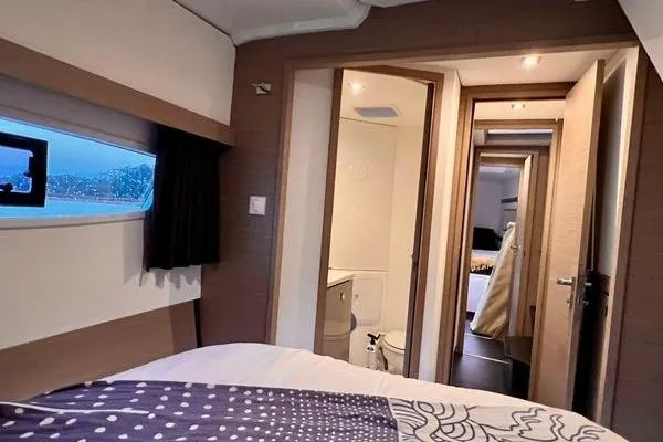 Slide: The Image of 2023 Fountaine Pajot Isla 40 yacht interior with cozy bedroom and modern bathroom. - 31