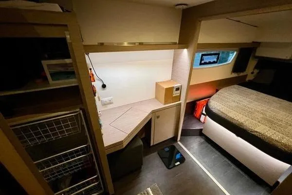 Slide: The Image of 2023 Fountaine Pajot Isla 40 interior cabin with modern design and cozy sleeping area. - 34