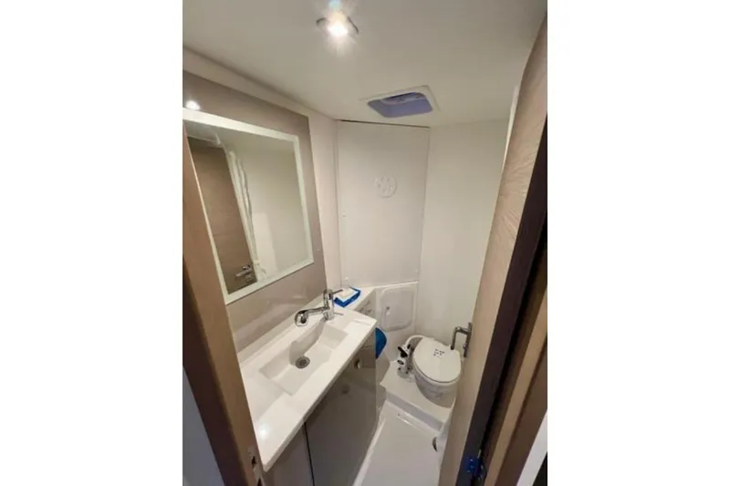Slide: The Image of Bathroom interior of 2023 Fountaine Pajot Isla 40 catamaran, featuring sink and toilet. - 39