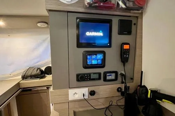 Slide: The Image of Control panel inside 2023 Fountaine Pajot Isla 40 catamaran with Garmin navigation system. - 43